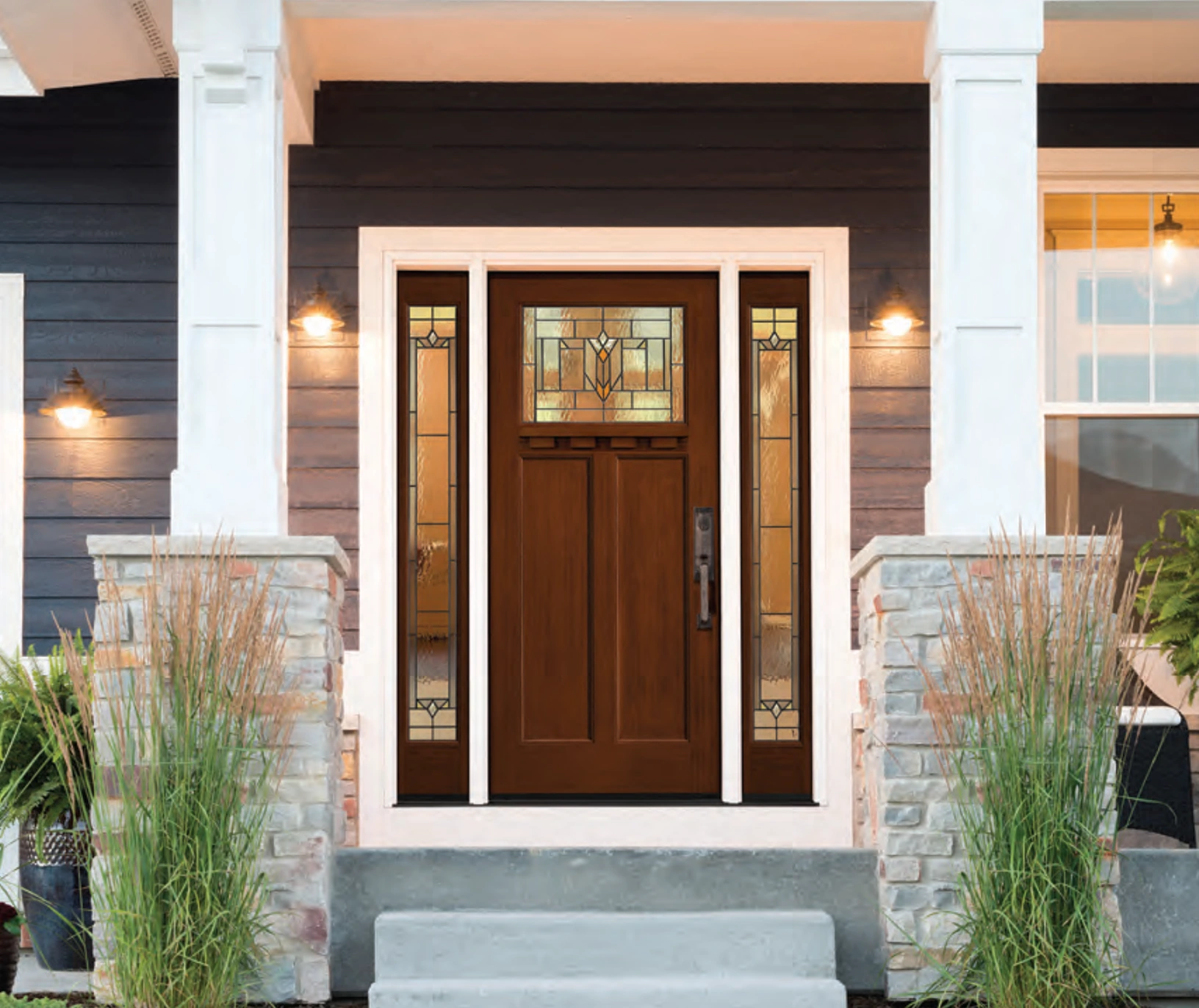 Wood entry door with decorative glass sidelights