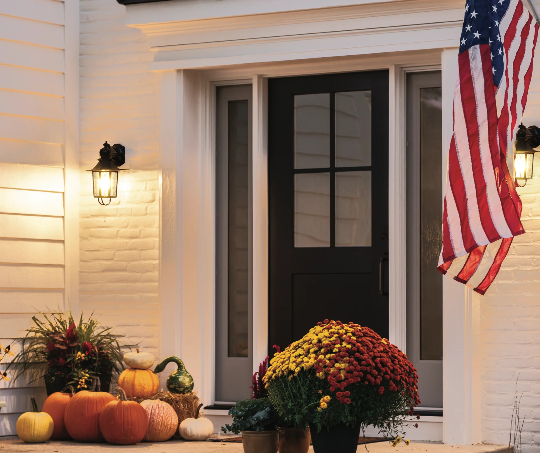 Black entry door with glass and sidelights